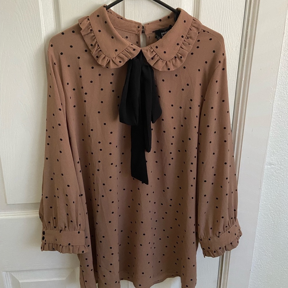 Ruffled and polka dot blouse
